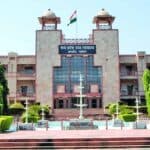 Madhya Pradesh High Court Orders Reinstatement of Worker with 50% Back Wages Due to Illegal Termination